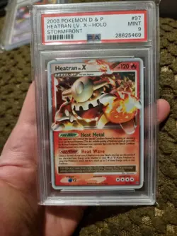 Heatran LV.X 97/100 Pokemon Card Stormfront PSA 9 - Image 1