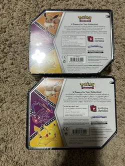 Lot Of 2 Pokemon Card Game (TCG): Eevee V Powers Tin & Pikachu V Powers Tin NEW - Image 2