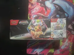 Pokemon Prismatic Evolutions Surprise Box + Booster Bundle Eevee - Image 1