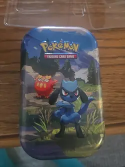 Pokemon Trading Card Game Riolu Tin ONLY With Sticker - Image 1