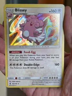 POKEMON BLISSEY 102/145 RARE HOLOFOIL GUARDIANS RISING NM CARD - Image 1