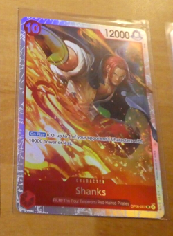 ONE PIECE WINGS OF CAPTAIN ENGLISH CARD GAME HOLO CARTE SHANKS OP06-007 SR EN NM - Image 1