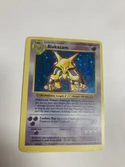 Pokemon Alakazam 1/102 Base Set (Shadowless) Unlimited Holo HP Off-Center - Image 1