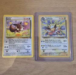 Pokemon TCG Jungle Jolteon Rare Holo 4/64 Eevee 51/64 - Image 1