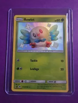 Pokemon TCG Rowlet Holo Rare Card Hidden Fates SV02/SV94 - Image 1