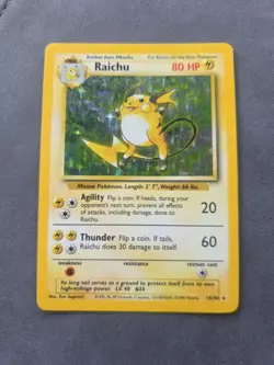 Pokemon TCG Raichu 14/102 Holo 1999 Wizards Base Set Copyright Holo Rare - Image 1