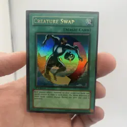 Yu-Gi-Oh! Creature Swap Legacy of Darkness LOD-081 1st Edition Holo Spell - Image 1