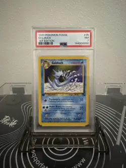1999 Pokemon Fossil Golduck 1st Edition PSA Grade 7 NM - Image 1