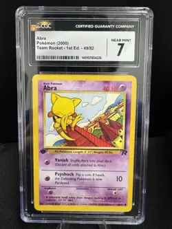 2000 POKEMON TEAM ROCKET 1ST EDITION #49/82 ABRA CGC 7 - Image 1