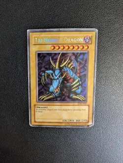 Yu-Gi-Oh! LOB-E000 Tri-Horned Dragon (Unlimited Edition) Secret Rare, HEAVY PLAY - Image 1