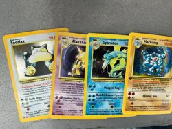 Lot of (4) Assorted Vintage Holo Pokemon Cards w/ Machamp - Image 1