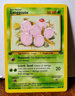 POKEMON EXEGGCUTE 52/64 1ST EDITION JUNGLE MP - Image 1