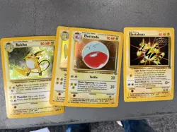 Lot of (4) Assorted Vintage Holo Pokemon Cards w/ Raichu - Image 1