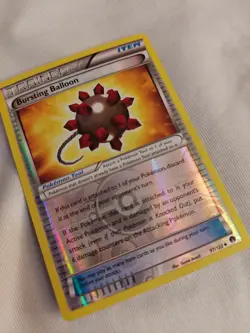 Bursting Balloon (97/122) Reverse-Holographic Pokemon card - Image 1