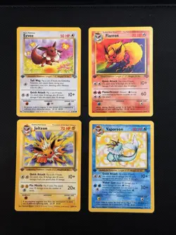Eevee Jolteon Flareon Vaporeon 1st Edition Pokemon Fossil WOTC Eeveelutions /64 - Image 1