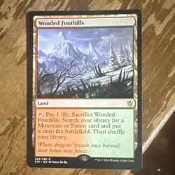 Wizards of the Coast Wooded Foothills Khans of Tarkir Land Colorless Rare Regul… - Image 1