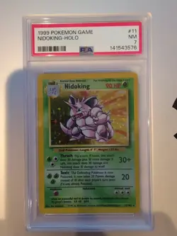 1999 POKEMON BASE SET UNLIMITED #11 NIDOKING-HOLO PSA 7 - Image 1