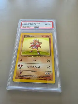 1999 POKEMON BASE SET UNLIMITED #7 HITMONCHAN-HOLO PSA 8 - Image 1