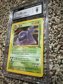 Pokemon TCG Muk 13/62 Holo Rare Fossil 1999 WOTC Near Mint Condition CGC 9 Mint - Image 1