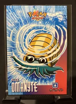 Pokemon 2024 Card Database Attacks Kanto Cracked Ice Holo Omanyte 138 Peru - Image 1