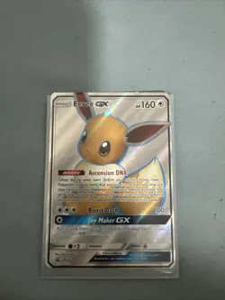 Pokemon TCG Eevee GX Full Art Holo Card SM242 NM Condition - Image 2