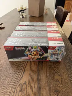 Pokemon Prismatic Evolutions Surprise Box Booster Bundle - Image 1