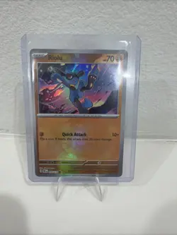 Pokemon TCG Prismatic Evolutions Riolu Card 050/131 Master Ball Reverse Holo - Image 1