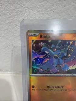 Pokemon TCG Prismatic Evolutions Riolu Card 050/131 Master Ball Reverse Holo - Image 2