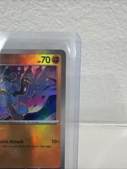 Pokemon TCG Prismatic Evolutions Riolu Card 050/131 Master Ball Reverse Holo - Image 3