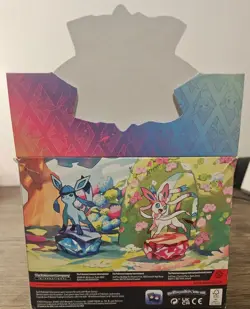 Pokemon TCG Prismatic Evolutions Mini Tin Open Display With 8 Sealed Tins - Image 2