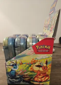 Pokemon TCG Prismatic Evolutions Mini Tin Open Display With 8 Sealed Tins - Image 3
