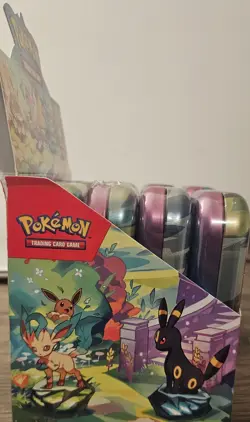 Pokemon TCG Prismatic Evolutions Mini Tin Open Display With 8 Sealed Tins - Image 4