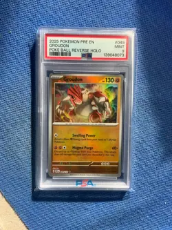 GROUDON 2025 POKEMON PRE EN PRISMATIC 049 REVERSE HOLO PSA 9 - Image 1