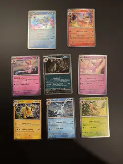 Pokemon Prismatic Evolutions Costco Cosmos Holo Eevee Evolution Set Of 8 - Image 1