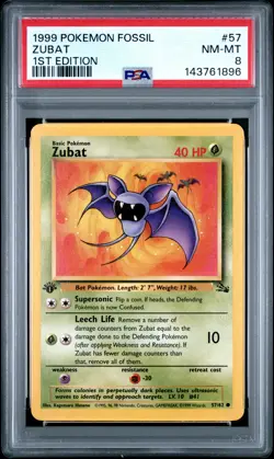 1999 POKEMON FOSSIL 1ST EDITION #57 ZUBAT PSA 8 - Image 1
