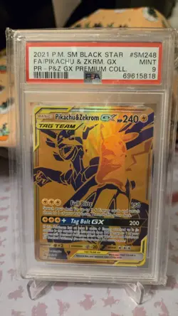 PSA 9 Pikachu & Zekrom GX Tag Team SM248 Promo Sun & Moon Pokemon 2021 - Image 1