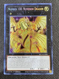 YuGiOh! - Number 100: Numeron Dragon BLCR-EN084 Secret Rare 1st Edition NM - Image 1