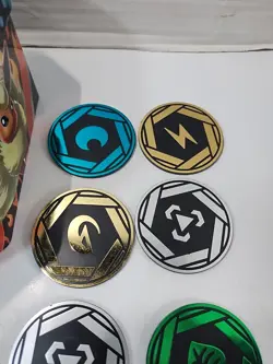 Lot of 16x Official Pokemon TCG Coins Lot & Vaporeon Evolutions Card Tin (Empty) - Image 2