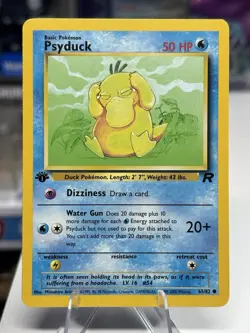 PSYDUCK - 65/82 1st Edition Team Rocket WOTC Vintage TCG Pokemon Card - Image 1