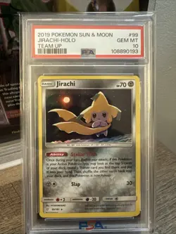 2019 Pokemon Sun & Moon Team Up Jirachi Holo Card PSA 10 #99 - Image 1