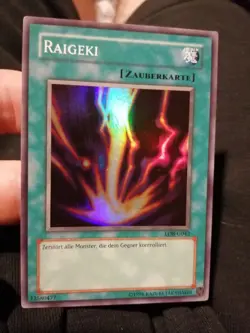 Yugioh Card Raigeki LOB-G042 Super Rare German Excellent - Image 1