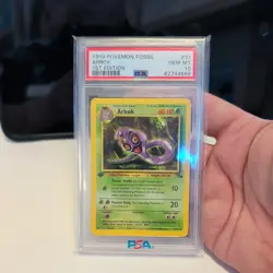 1999 Pokemon TCG Fossil Arbok #31 1st Edition PSA 10 - Image 1
