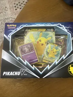 Pokemon TCG Pikachu V Box w/ 2 Evolving Skies & Brilliant Stars Booster Packs - Image 1