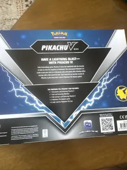 Pokemon TCG Pikachu V Box w/ 2 Evolving Skies & Brilliant Stars Booster Packs - Image 4