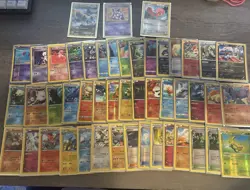 Pokemon TCG Card Lot 95+ Holo, Reverse Holo & Regular (Estimated Value $184.56) - Image 1