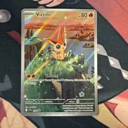 Victini SVP 208 Black Star Promo Pokemon Card NM | Prismatic Evolutions - Image 1