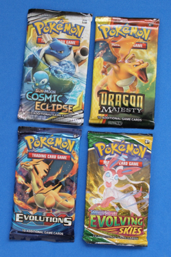 POKEMON 4 BOOSTER PACKS DRAGON MAJESTY, EVOLVING, XY EVOLUTION, COSMIC SEALED - Image 1