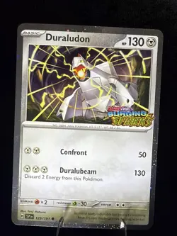 Pokemon TCG Duraludon 129/191 Surging Sparks Stamped Cosmos Holo Promo Card - NM - Image 1