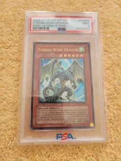 PSA 9 - YUGIOH - 2009 - RGBT-EN003 - STRONG WIND DRAGON - FIRST - ULTIMATE - Image 1