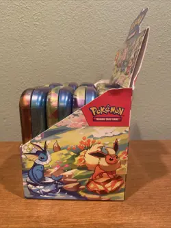 Pokemon TCG Prismatic Evolutions Full Set of 8 Sealed Mini Tins With Display - Image 4